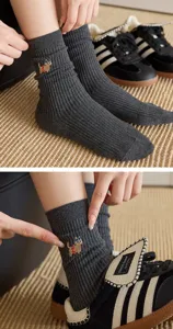 Grey ribbed mid-calf socks for women featuring cute cartoon embroidery, comfy cotton daily wear.