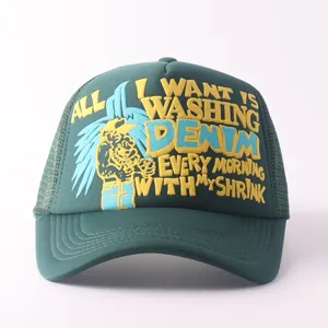 Green mesh baseball hat detail showing front colorful 3d embroidered text graphic and design.