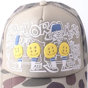 Camouflage trucker hat with embroidered smiley face and letter design for outdoor wear.