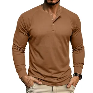 Men thermal waffle knit long sleeve henley shirt detail view featuring three buttons.