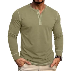 Close-up detail of mens long sleeve Henley shirt with contrast stitching and buttons.