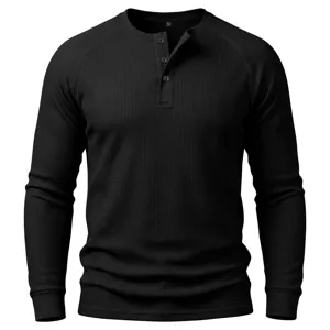 Black thermal waffle knit long sleeve henley shirt detail view with three front buttons.