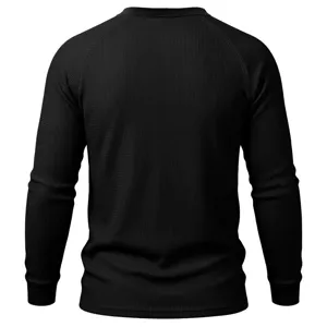 Detail view of black waffle knit long sleeve shirt back design, showing texture and clean fit.