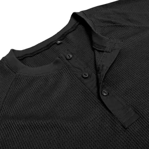 Close-up detail of black waffle knit long sleeve Henley shirt collar and three button placket.