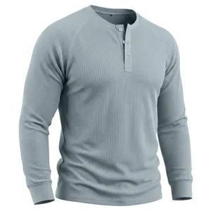 Close up view of the mens long sleeve waffle knit Henley shirt collar and buttons detail.
