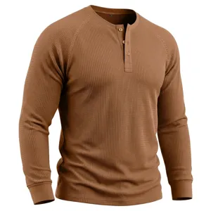 Men's brown waffle knit long sleeve henley shirt detail view showcasing three buttons.