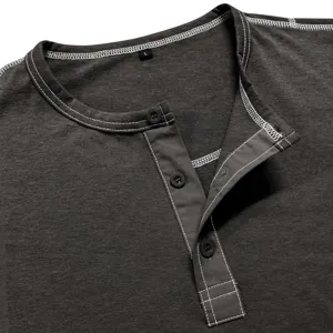 Detail view of men's long sleeve Henley shirt, dark gray fabric with white contrast stitching.