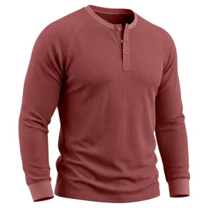 Men's waffle knit long sleeve Henley shirt featuring a 3-button placket and textured fabric.