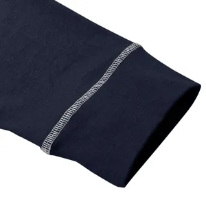 Close-up detail of dark navy blue men's long sleeve henley shirt cuff with white contrast stitching.