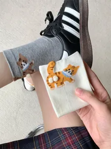 Cute 3D cat cartoon mid-tube socks detail shot, funny pompom kitten design for women daily wear.