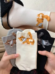 Cute 3D cat pom-pom mid tube socks for women, quirky cartoon animal cotton socks, soft and comfy.