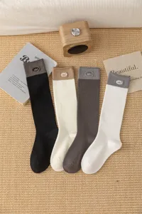 Calze lunghe donna colore contrasto lettera ricamata, calze polpaccio a costine casual.
