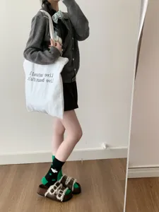 Calzini medi a pois verdi da donna tendenza carino casual moda cotone comfort.