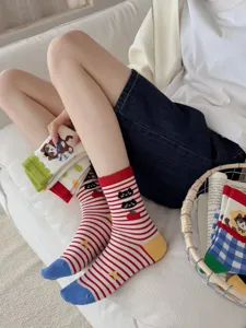 Cute dopamine style striped women socks with cat design, colorful cotton crew socks.