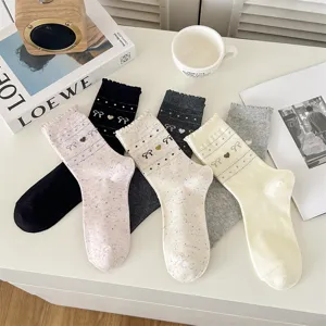 Women retro bow cotton crew socks detailed view showing various colors and cute heart patterns.