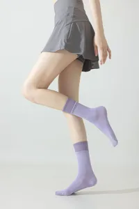 Professional pilates yoga grip socks for women, mid-tube anti-slip fitness sports socks.