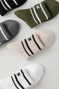 Men's mid-calf striped cotton socks with embroidery, breathable casual athletic crew socks.