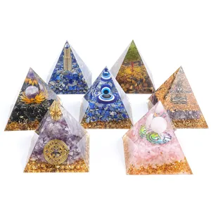 Set of seven natural crystal orgone pyramids with healing stones and mystical symbols