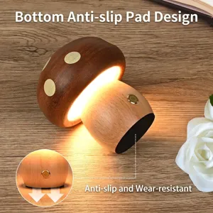 Detail view of the wooden mushroom lamp showing the anti-slip base and warm light