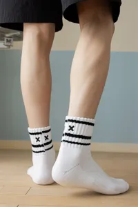 Men's mid-calf sports cotton socks with black stripes and embroidery, comfortable loop towel bottom.