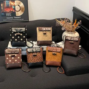Korean retro crossbody phone bag with chic polka dot and leopard pattern designs.