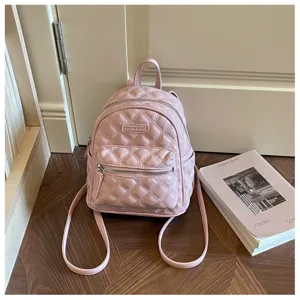 Roze gewatteerde mini-rugzak detail, PU-leder casual schooltas met voorvak met rits.