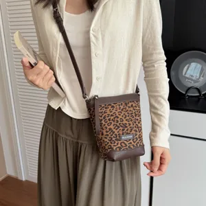 Stylish leopard print crossbody phone bag for women, chic single shoulder bag daily use.