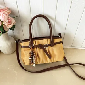 Borsa a tracolla retrò da donna in colore giallo con manici in pelle marrone e perline in legno.