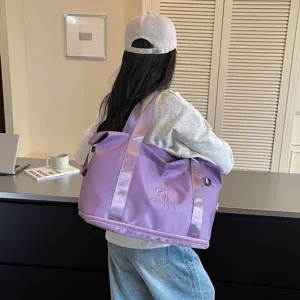 Purple travel gym bag for women, large capacity waterproof duffel bag for sports and fitness.