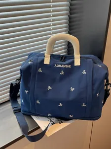 Bolso de viaje de gran capacidad con bonito bordado de lazo, bolsa deportiva ligera y práctica.