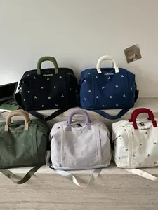 Gran bolsa de viaje con diseño bordado, bolsa de equipaje portátil para viajes cortos.