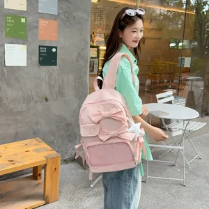 Rosa Schleife Rucksack für Damen süßer lässiger Tagesrucksack mit Netztasche Stern Anhänger Alltag