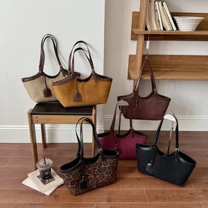 Detailed shot of stylish vintage women tote bags in multiple colors, large capacity shoulder bags.