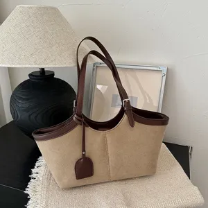 Retro canvas tote bag for women, large capacity PU leather shoulder bag and stylish handbag.