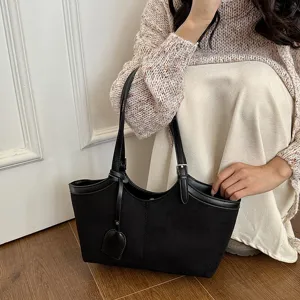 Black faux leather women shoulder tote bag retro underarm bag with double straps and metal buckles.