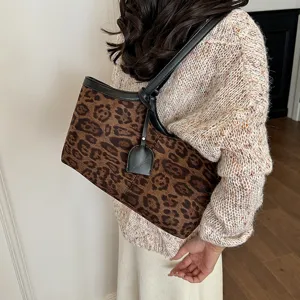 Stylish leopard print tote bag for women, vintage underarm shoulder bag with black strap design.