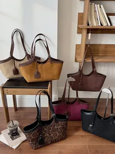 Fashion retro women's tote bag, versatile casual shoulder underarm bag with large capacity.