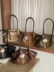 Korean style vintage suede tote bag with cute bear pendant, casual shoulder handbag.