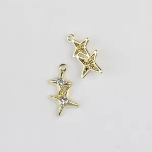 Pendentifs double étoile en alliage doré avec zircons étincelants pour bijoux DIY.