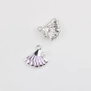 Pendentif coquillage en alliage argenté avec émail violet pour fabrication bijoux DIY.