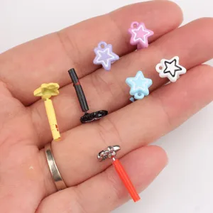 Close-up of colorful pentagram star earring studs DIY jewelry accessories parts