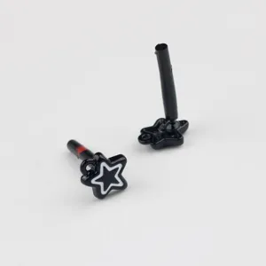 Detail shot of black painted star stud earring pins with hanging loop for DIY jewelry making accessories.