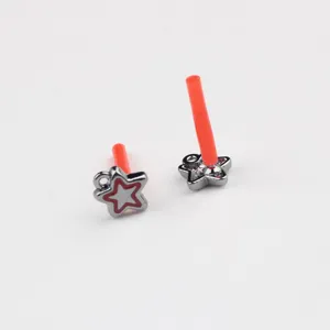 Alloy painted pentagram star ear studs DIY jewelry accessories close up detail display.