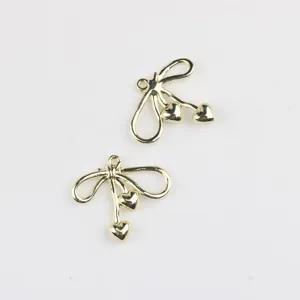 Gold alloy bow heart charms pendants for DIY necklace bracelet earrings jewelry making.