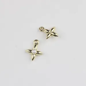 Pendentif étoile en alliage doré avec détail de perle pour la création de bijoux DIY.