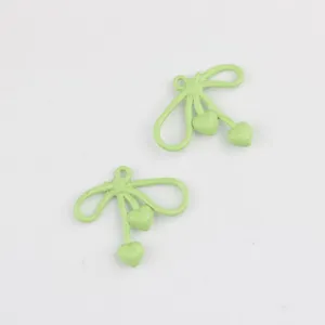 Light green alloy bow heart pendant detail shot, perfect for DIY jewelry making accessories.