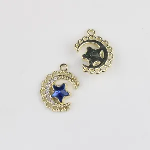 Close-up detail of gold alloy moon star crystal charm pendant for DIY handmade jewelry.
