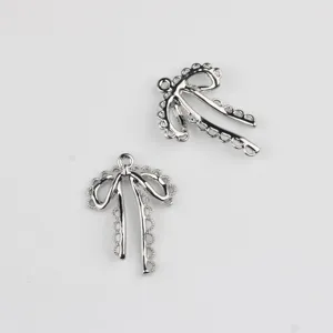 Silver alloy hollow lace bow pendant charms for DIY handmade bracelet necklace earrings jewelry.