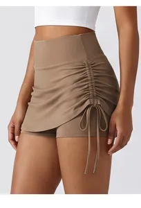 High-waist pleated athletic yoga skirt, fake two-piece anti-glare sports mini skirt for women.