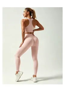 Set yoga senza cuciture rosa vista posteriore, leggings push-up, reggiseno sportivo.